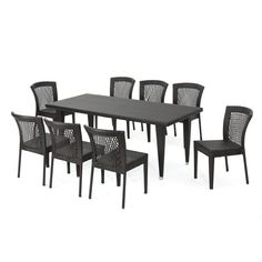 an outdoor dining table with eight chairs