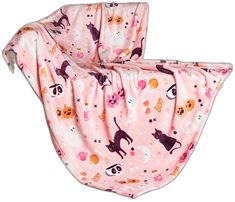 a baby's pink blanket with cats and dogs on it, sitting in front of a white background