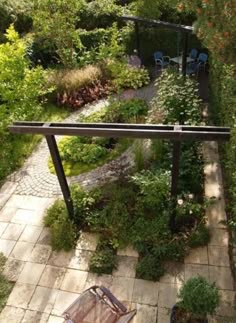 an aerial view of a patio and garden