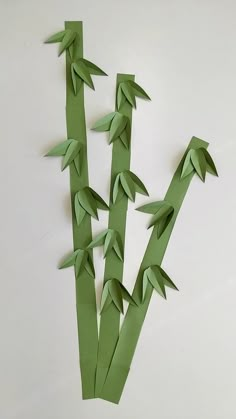 the paper is made to look like bamboo sticks with green leaves on top and bottom