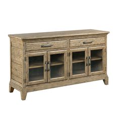 a large wooden cabinet with glass doors on the top and bottom drawers in different sizes