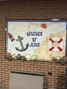 there is a sign on the wall that says, rescue by jesus and an anchor