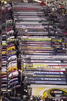 rows of skis are lined up in the warehouse