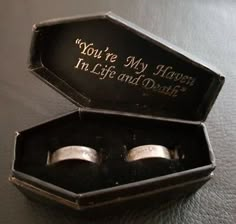 two wedding rings in a black box with the words you're my heaven