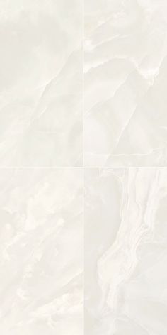 white marble tiles are arranged in four different squares, with the same color and pattern