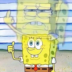 spongebob holding up his thumb and giving the thumbs up in front of him