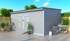 a small gray shed sitting on top of a wooden deck next to a green tree