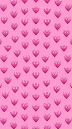 a pink background with many hearts on it