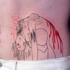 a woman's lower back tattoo with blood dripping down the side and an elephant on it