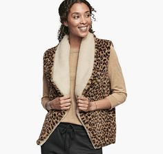 Plush leopard-print on one side reverses to soft sherpa on the other for extra styling options.  Easy cascade open-front shows off the reverse. Side pockets on leopard-print side. Wool/poly/nylon/acrylic/rayon shell; poly lining. Dry clean. Imported. 25½” long. One Size; fits 2-16. Sherpa Vest, Johnston Murphy, Front Open, Leopard Print, Faux Fur, Animal Print, Coats Jackets, Dry Clean, Wool