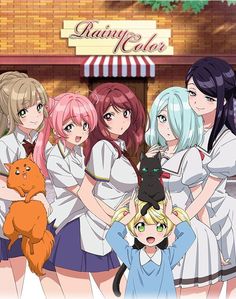 the girls are standing in front of a store with an orange cat on their shoulder