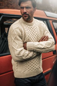 Introducing the Clyde Cable Knit Jumper from &SONS, a timeless piece crafted for those who embrace the pioneering spirit and aim to carry a legacy forward. Inspired by the rugged elegance of classic style icons, this jumper pays homage to traditional knitwear with a contemporary twist. Its intricate cable knit pattern and high-quality craftsmanship ensure it remains a wardrobe staple, perfect for layering and offering warmth and sophistication in equal measure. Designed to be cherished and passe Classic Cream Outerwear With Crew Neck, Classic Style Icons, Mountain Chic, Crown Affair, Thomas Crown Affair, Holiday 2024, Work Wear Outfits, Stocking Fillers For Her, Cable Knit Jumper