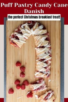 a wooden cutting board topped with raspberry candy cane danish