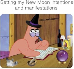 a cartoon character sitting at a table with an open book in front of him and the caption reads setting my new moon intentions