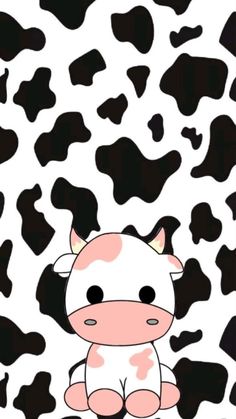 a cartoon cow sitting in front of a black and white background with lots of spots