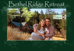 a man and woman sitting next to each other in front of a cabin with trees