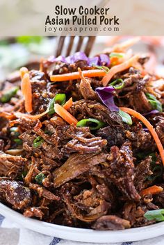 a close up of a plate of food with meat and veggies on it