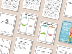 a collection of family roles worksheets on a table