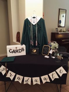 a table with some graduation decorations on it