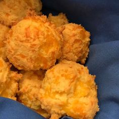 some fried food is in a blue bowl