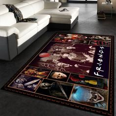 a living room area rug with pictures on the floor and in front of a white couch