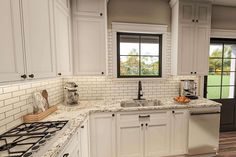 a kitchen with white cabinets and marble counter tops