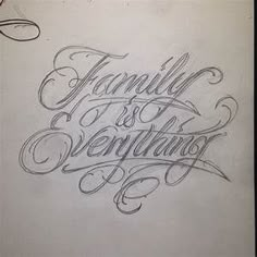 the words family and everything are written in cursive writing