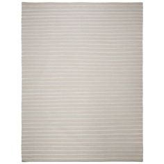 a white rug with vertical stripes on the bottom, and an off - white background