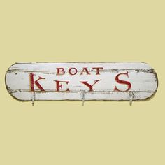 a wooden sign that says boat keys on it