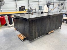 a workbench in a garage with some tools on it