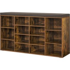 a large wooden shelf with many compartments