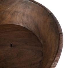 an old wooden bowl is shown on a white background