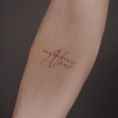 a person's arm with a tattoo that reads the power of your