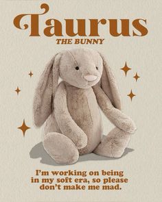 a stuffed animal sitting on top of a white sheet with words below it that reads taurus the bunny