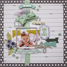 a scrapbook page with an image of a baby