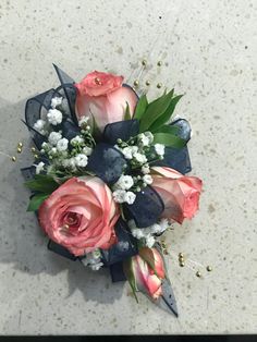 a bouquet of flowers sitting on top of a table