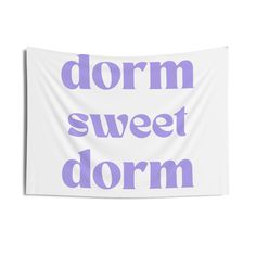 a purple and white wall hanging tapestry with the words dorm, sweet dorm on it