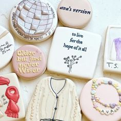 decorated cookies are arranged on the table for someone's special occasion to be served