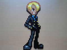 an image of a cartoon character made out of beads