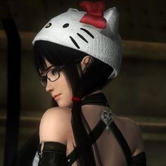 a woman with glasses and a cat hat