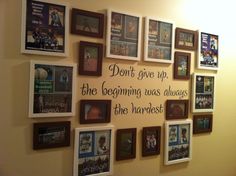 a wall with many different framed pictures on it and a quote written in the middle