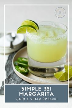 a margarita with limes and sugar on the rim