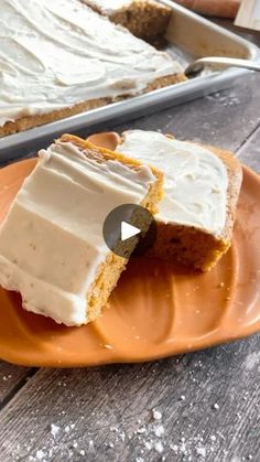 a piece of cake sitting on top of an orange plate next to a baking pan