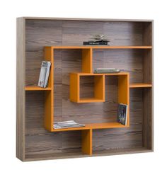 an orange book shelf with books on it