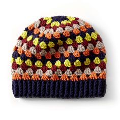 a multicolored knitted beanie hat on a white background