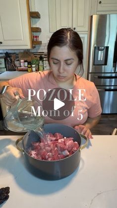 a woman pouring water into a pot with meat in it and the words pozole mom of 5 above her