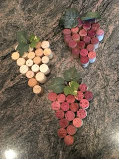 three wine corks sitting on top of a granite counter