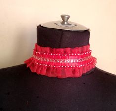 Silver in red organza ruffled collar. Can be made as a set with wrist cuffs. You can measure if you want.  length 13" READY TO SHIPP Please check your registered address on Etsy is up to date before purchasing EXSPRESS SHIPPING: need PHONE NUMBER Express shipping option available for countrys.You can see it when you buy and select your country We recommend you to send your phone number with a message in the fast cargo option. When the cargo does not find you on your adress. The product will not come back to me and it will be destroyed. The seller does not accept responsibility in this case The buyer is responsible for the customs fees. STANDART SHIPPING İtems will send you with traditional mail, PTT (Turkish Post Office) is sent as a tracking number Signed unless otherwise for delivery shi Clown Collar, Ruffled Collar, Wrist Cuffs, Choker Collar, Choker Necklaces, Come Back, Phone Number, Favorite Jewelry, No Response