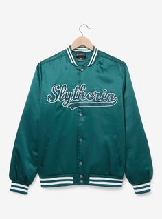 Show your Hogwarts House pride with this Harry Potter-inspired jacket! Featuring applique "Slytherin" lettering across the front  the back includes and embroidered snake design. With ribbed hems  snap buttons  and front pockets  this bomber-style jacket is perfect for your next Quidditch match.A BoxLunch Exclusive!Outer shell: 100% polyester satin Lining fill: 100% polyesterListed in unisex sizesWash cold with like colors; dry lowImported Slytherin Wardrobe, Harry Potter Clothes Slytherin, Harry Potter Jacket, Slytherin Stuff, Embroidered Snake, Slytherin Outfit, Harry Potter Hoodie, Harry Potter Slytherin, Harry Potter Images