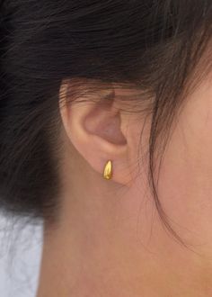 Size: 10mm x 4.2mm Description: Simple and minimalistic tiny droplet stud earrings. Stainless steel. Stainless steel is a very durable and strong metal and is considered very high quality for jewelry. It has a very sleek appearance and is a good choice for casual and everyday wear.  Check out my shop for more items: https://www.etsy.com/shop/TenthRealmStudio Message me with any questions or concerns you may have, I'll respond instantly! Thank you for checking out my shop, enjoy shopping! :) Minimalist Yellow Gold Hypoallergenic Teardrop Earrings, Dainty 14k Gold-filled Teardrop Earrings, Hypoallergenic 14k Gold-filled Gold Earrings, Minimalist 14k Gold-filled Silver Earrings, Minimalist Hypoallergenic 14k Gold-filled Earrings, Minimalist Earrings, Jewelry Earrings Studs, Silver Plate, Favorite Jewelry